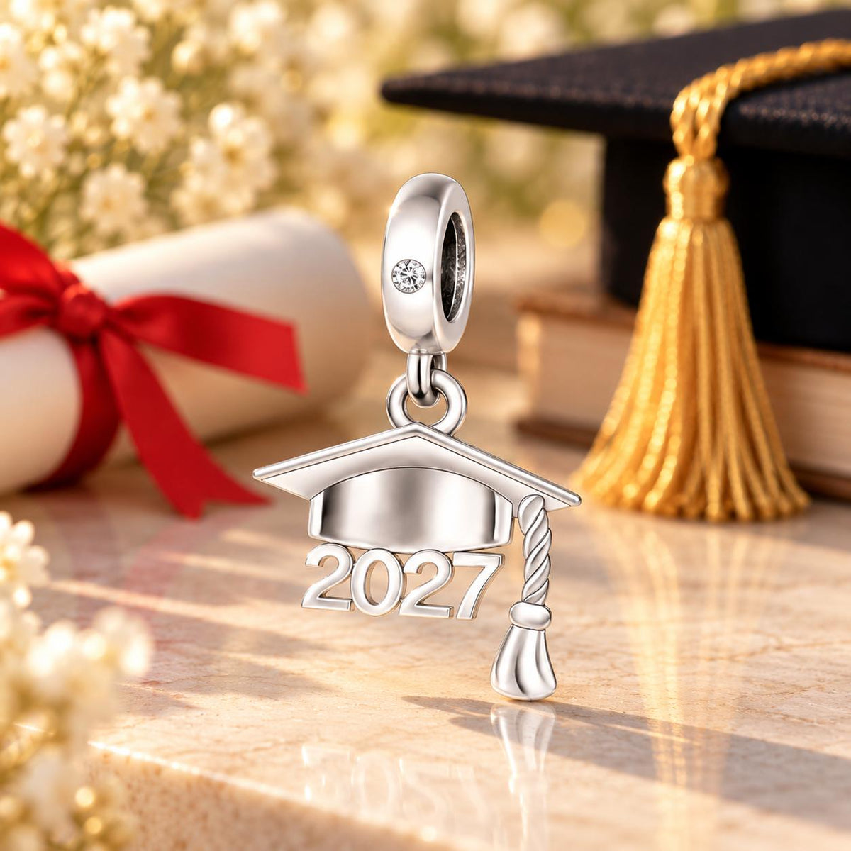 Silver 2027 graduation cap charm with graduation gift props