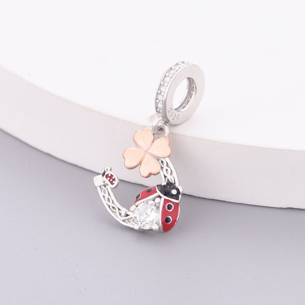 "Luminous Fortune" - 925 Sterling Silver Ladybug Clover Horseshoe Dangle Charm