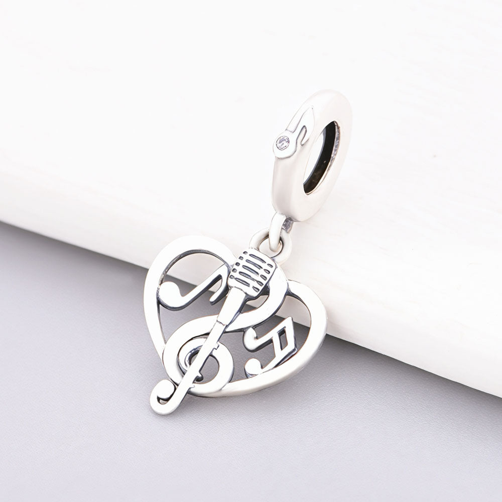 "Melodic Pulse" - 925 Sterling Silver Treble Clef Microphone Music Heart Charm