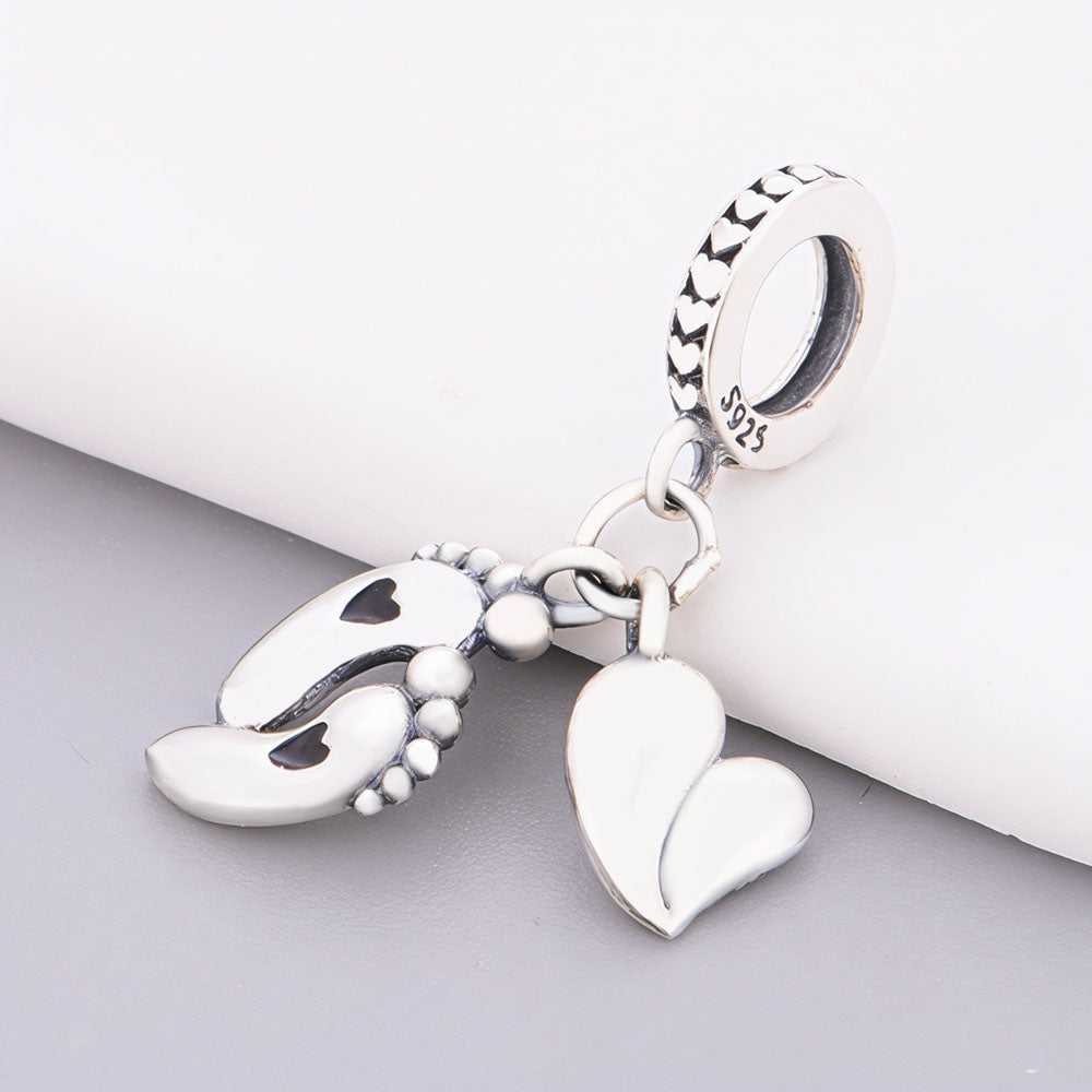 "Newborn Echo" - 925 Silver Baby Footprints & Polished Heart Dangle Charm