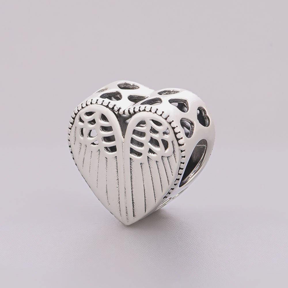"Guardian Wings" - 925 Silver Hollow Heart Angel Wing Charm