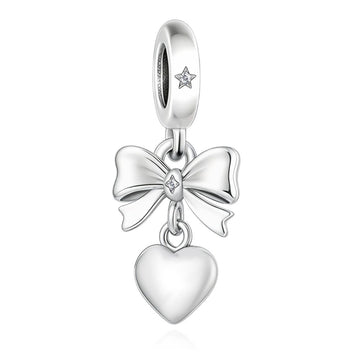 "Heartbound Rhythm" - 925 Silver Bow Knot & Tender Heart Dangle