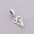 Close-Up of Cute Mouse and Cheese Charm with Pink Enamel Details