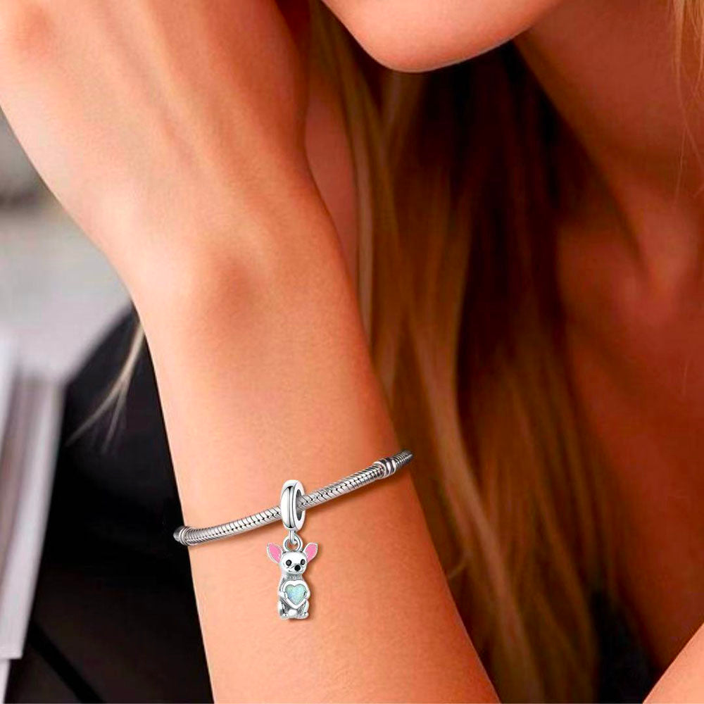 Detailed Chihuahua dangle charm with pink enamel accents and an opal heart